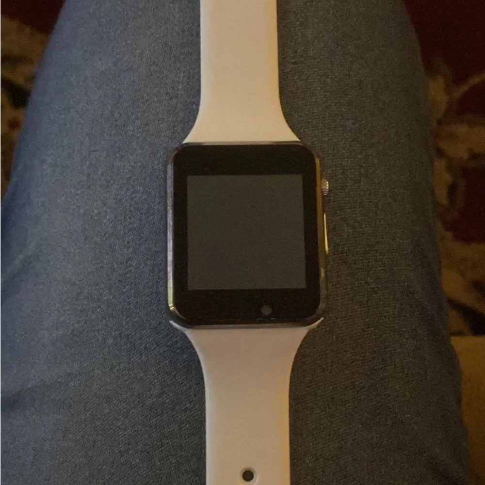 White Smart watch with camera facebook connect, email, text, and music